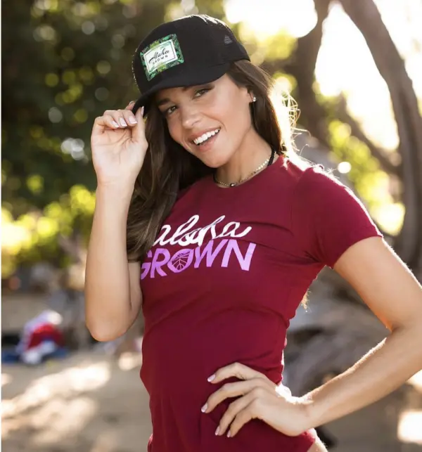 Girl wearing cap and tee shirt